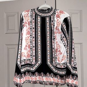 Beautiful woman’s blouse long sleeves no brand name never worn size large